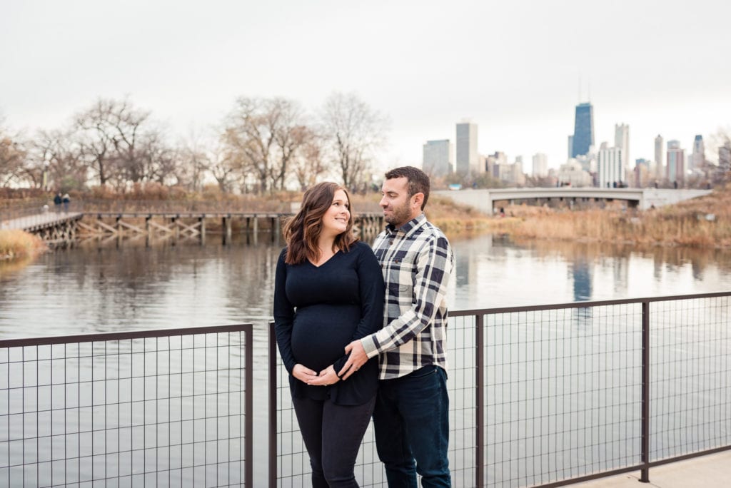 Maternity pictures in chicago girl in black at Lincoln park nature boardwalk