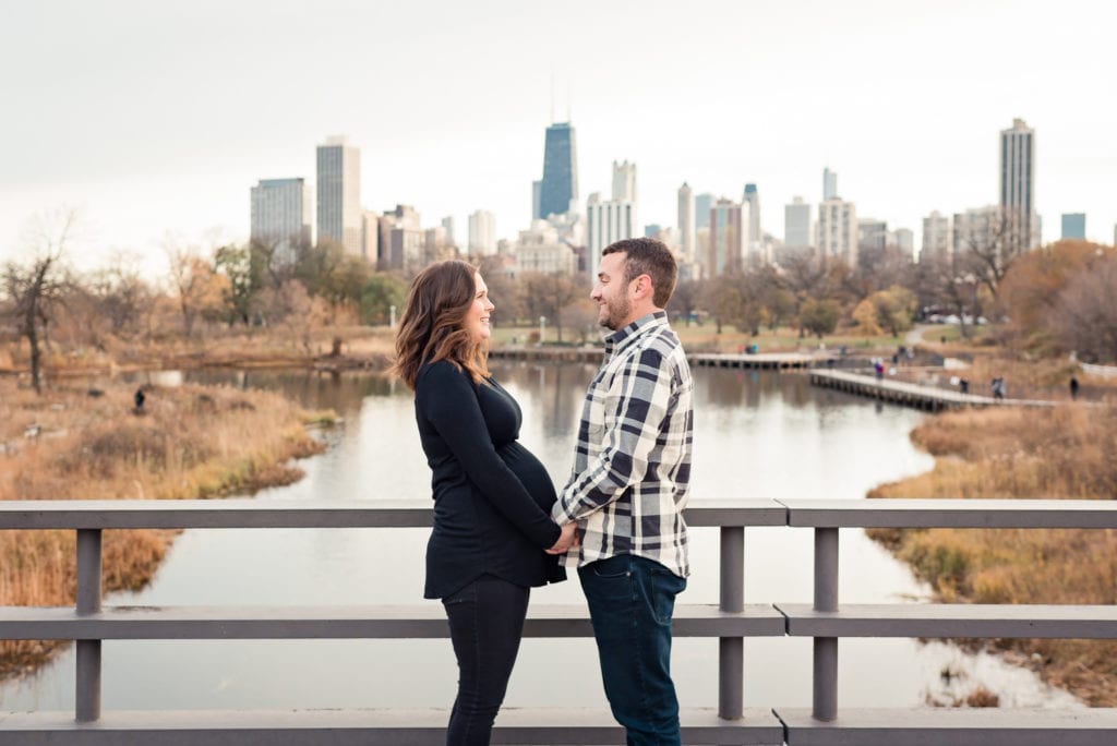 sears tower in the background at Lincoln park nature boardwalk maternity pictures